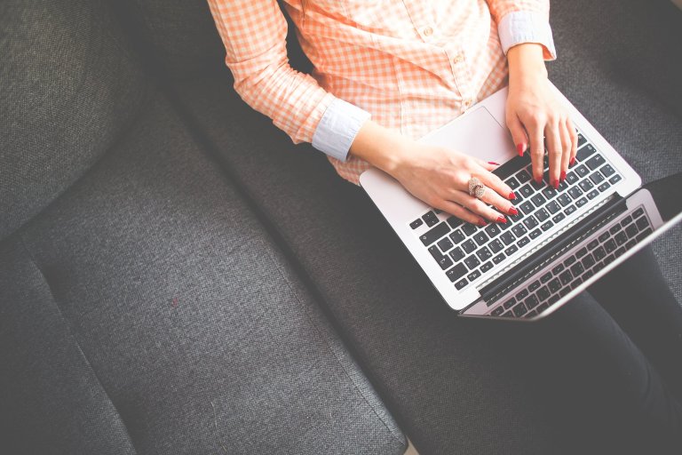 a woman using a laptop