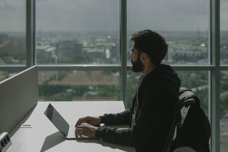 a man with a laptop