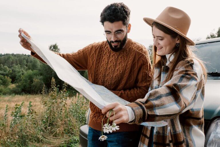 a couple with a map