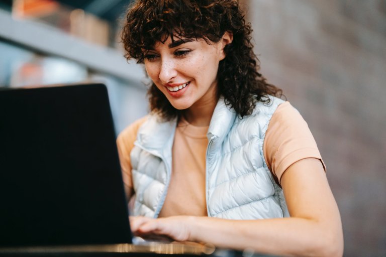 a mature woman with a laptop