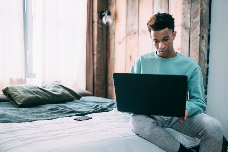 a man with a laptop