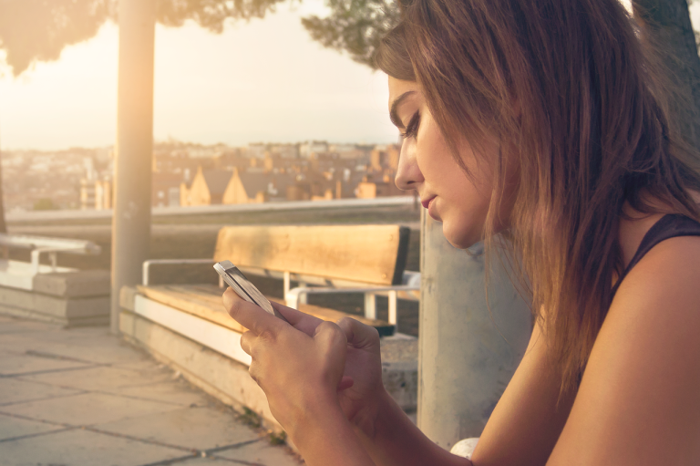 a woman with a smartphone